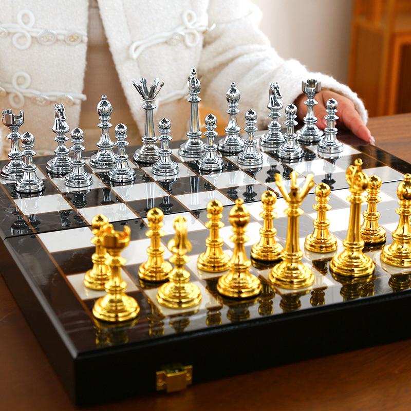 

Роскошный шахматный набор Большая портативная настольная игра Металлические шахматные фигуры Складная шахматная доска Детские настольные игры Украшения для гостиной