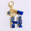 1 Stück Buchstaben-Charms-Anhänger mit Strasssteinen und Quaste Blaue Harz Initialen Schlüsselanhänger Stilvolles Geschenk für Frauen