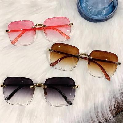 Retro bezramkowe okulary przeciwsłoneczne z owalną metalową oprawką i modnymi tonacjami kolorystycznymi