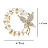 Women's round pearl and rhinestone brooch, Baroque style, modern elegance, butterfly design, suitable for parties and weddings.