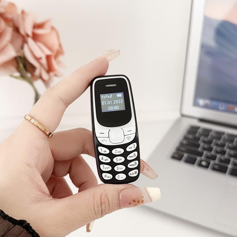 

Мини мобильный телефон BM35 ультрамаленький карманный Bluetooth набор номера две SIM-карты двойной режим ожидания недорогой аппарат кнопочный моноблок синий