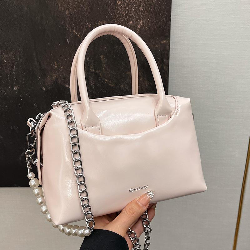 

2025 spring and summer new Korean version temperament simple portable women s bag casual versatile solid color commuter shoulder messenger bag