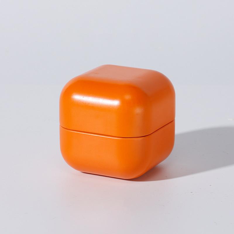 

Портативна однотонна міні-бляшана коробка Банка для чаю з герметичною кришкою Пакувальна коробка Ювелірні вироби Цукерки Маленька банка для зберігання Монети Сережки Навушники Подарункова коробка помаранчевий