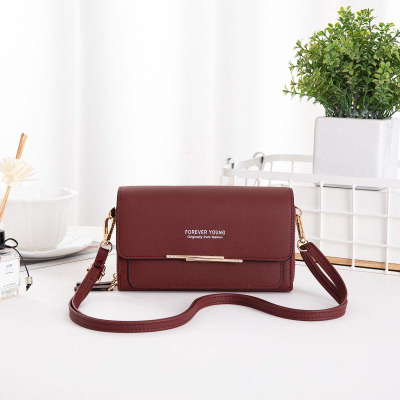 Elegant Leather Shoulder Bag For Women With High Capacity And Adjustable Strap