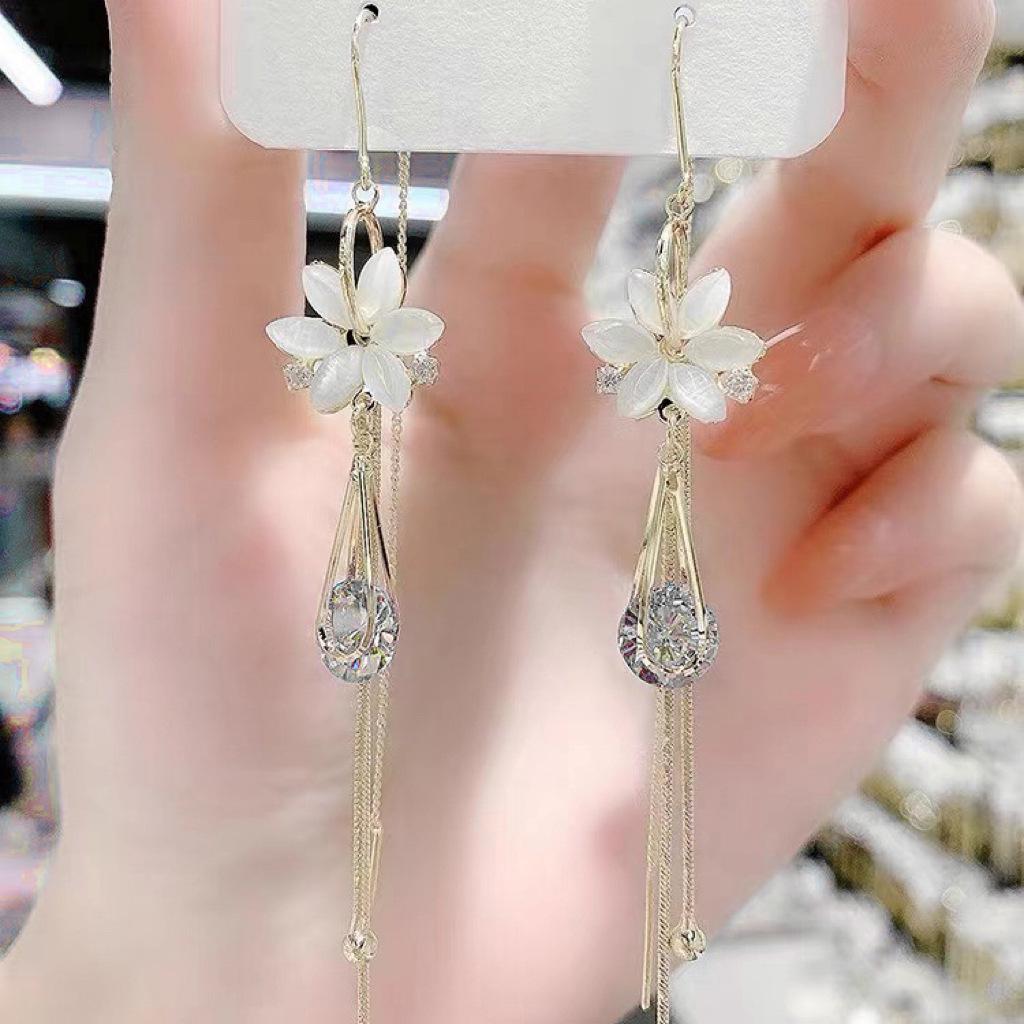 Cat's Eye Tassel Ear Chain 2024 Trend: Elegant Long Earrings with Light Luxury Design