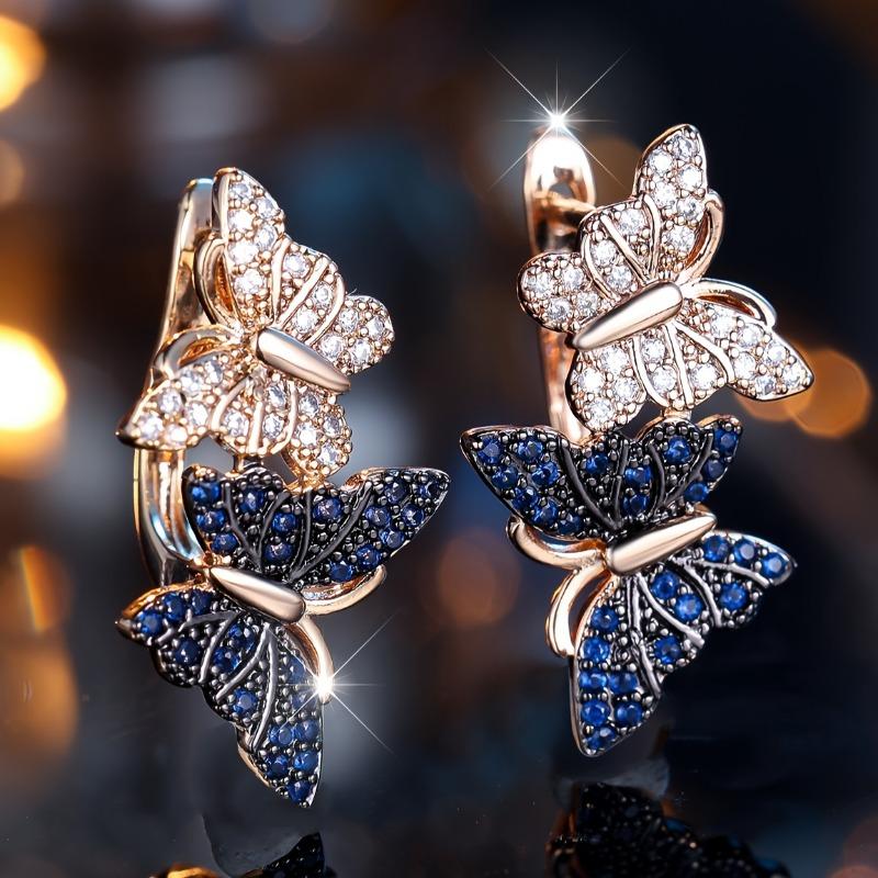 A Pair of Elegantly Styled Butterfly Hoop Earrings Perfect for a Able Party.