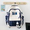 Large capacity ins wind backpack female junior high school high school student lightweight schoolbag computer backpack male trendy model