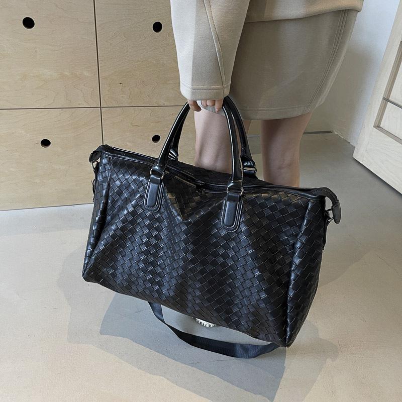 New fashion new PU leather woven portable travel bag large capacity shoulder messenger bag casual Korean version travel bag