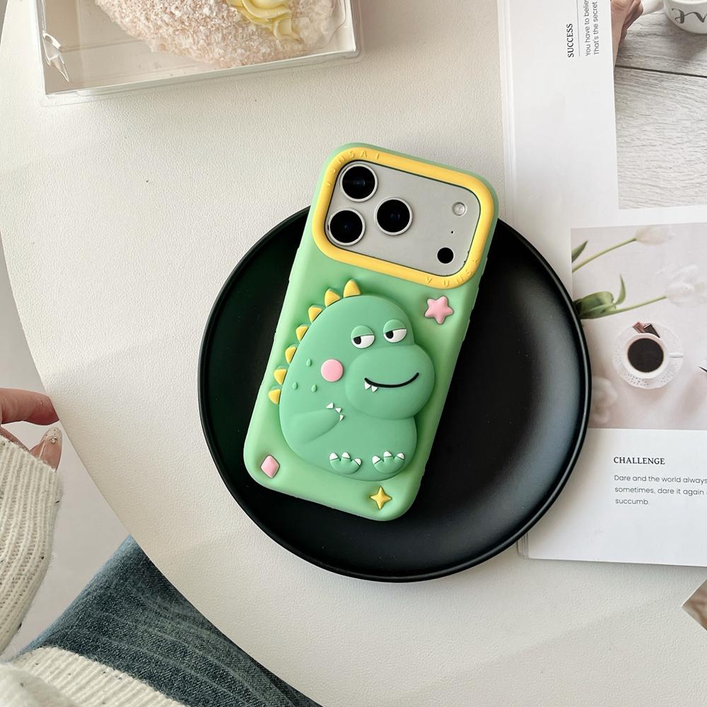 KEYSION Uroczy Kreskówkowy 3D Zabawny Dinozaur Etui na Telefon dla iPhone 13 14 15 16 17 Pro Max Miękki Silikon Podpórka Odporny na Wstrząsy Pokrowiec