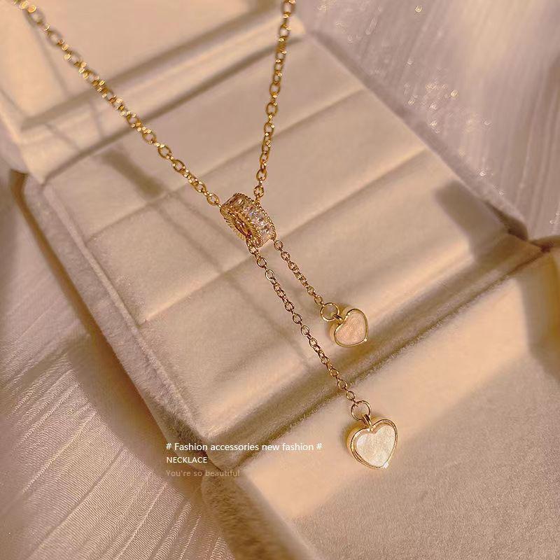 Titanium Steel Heart Pendant Clavicle Necklace with Mother-of-Pearl Tassel - Elegant and Stylish Women s Design