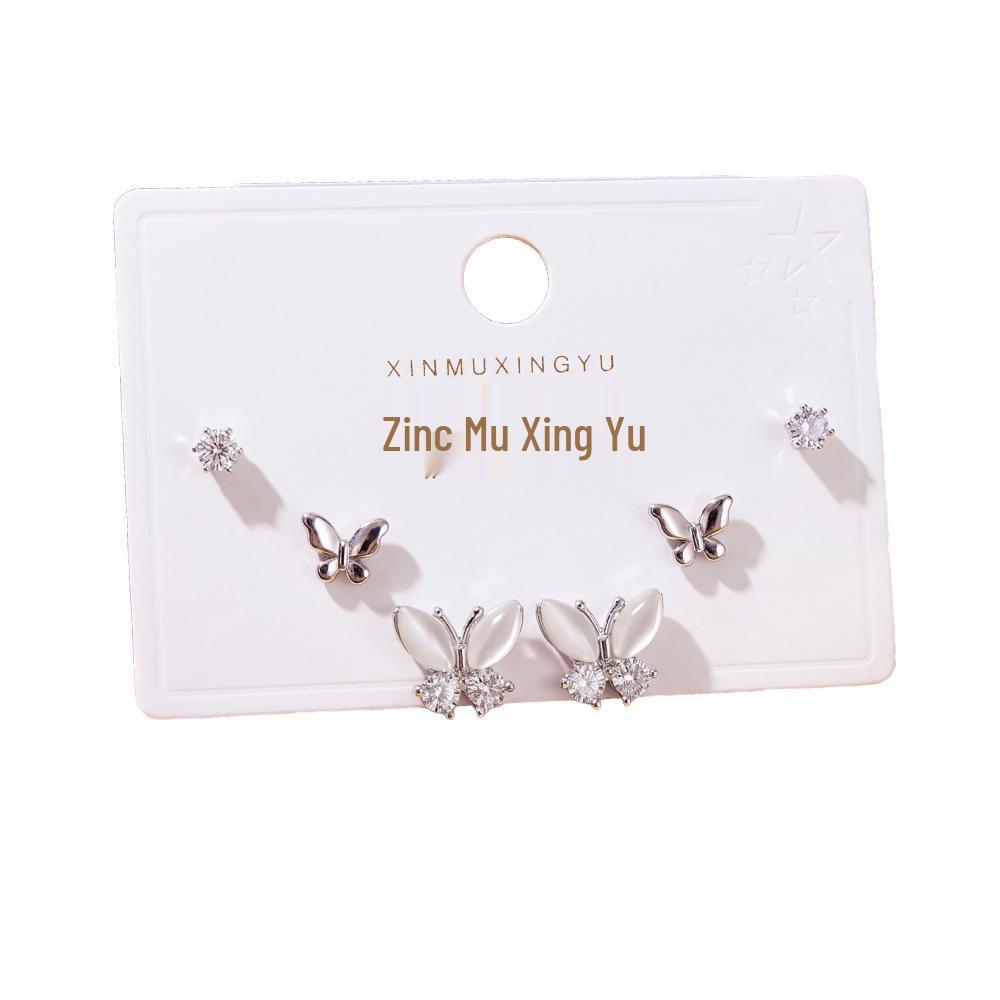 Copper-Plated Gold Butterfly Earrings with Micro-Inlaid Zircon - Fashionable, Versatile, and Luxurious for Women.