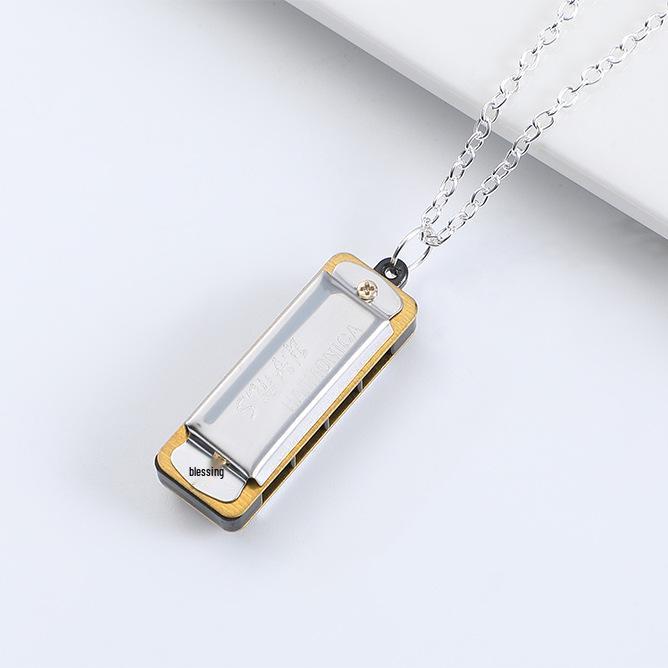 Collar de Armónica Swan Cross de 4 Agujeros: Mini Instrumento de Viento para Niños y Principiantes