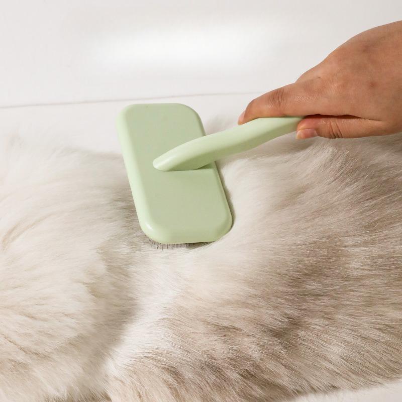 The Dog Comb Is More Comfortable Than The Bear Comb with A Special Puller Band and Airbag. The Pet Fluffy Beauty Needle Comb