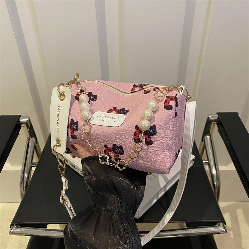 Exquisite high-end textured small bag 2025 summer new small fresh powder grid pillow bag versatile messenger shoulder bag