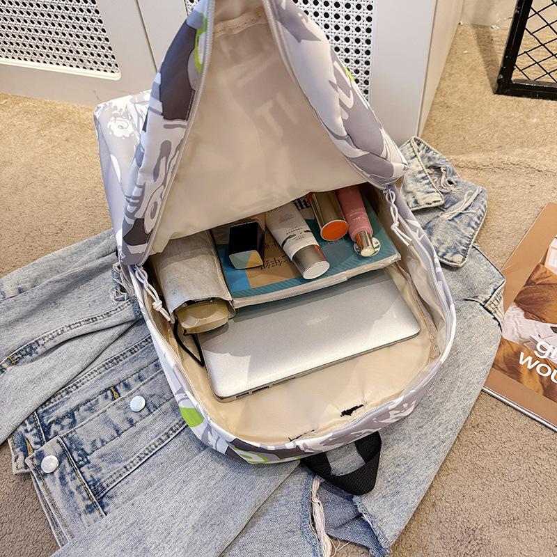 Schoolbag new schoolbag large capacity backpack graffiti printing Korean version high school student trend backpack leisure student backpack