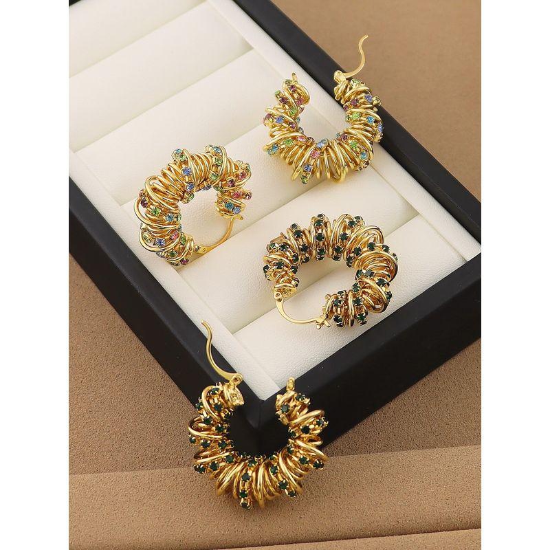 European and American Style Hollow Braided Twist Earrings with Emerald Zircon Wrapped Design Round Ear Hoops Vintage Niche Earrings