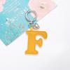 Colorful PU Leather Keychain with Peach Heart and 26 English Letter Charms