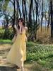 French yellow suspender dress women's clothing summer seaside vacation style wear skirt loose word skirt long skirt
