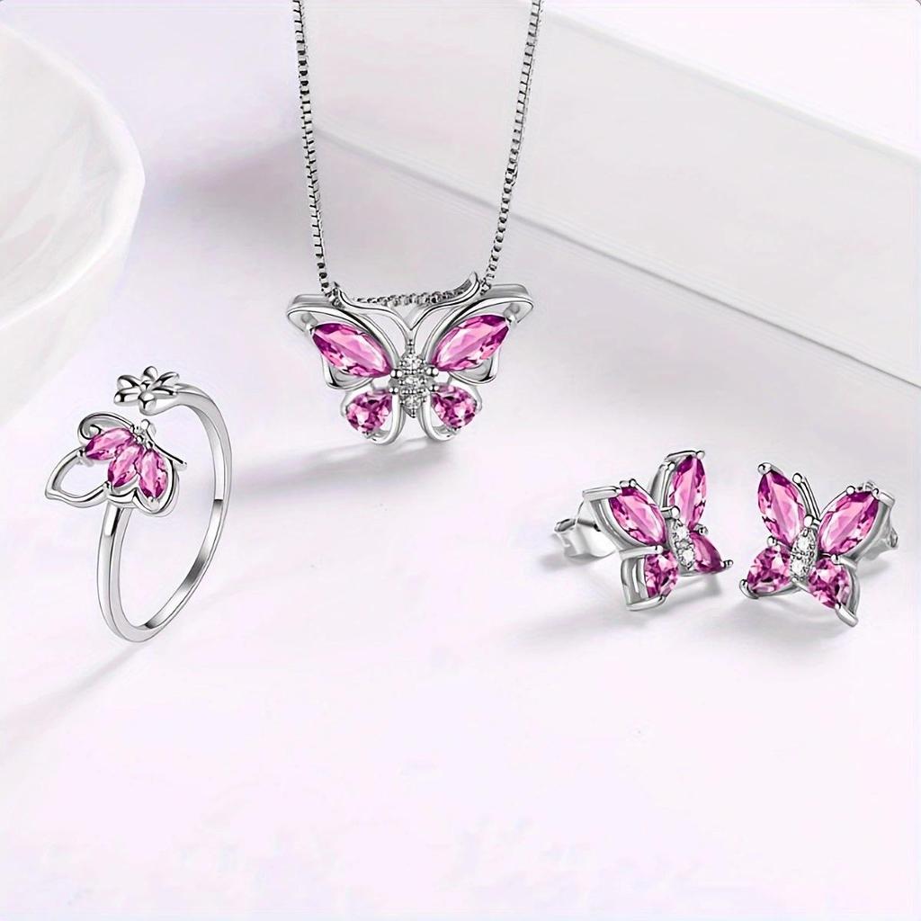 Four-piece set of butterfly stud earrings and rings with stylish, multicolored pendants, perfect for women's daily wear.