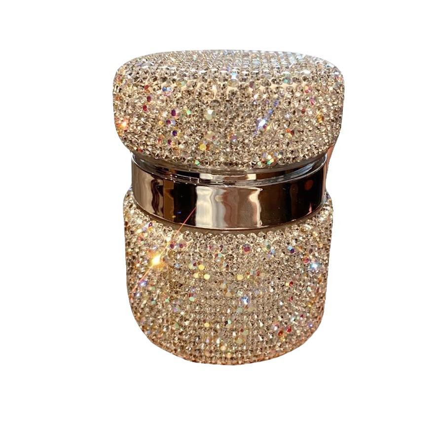 Rhinestone-Embellished Travel-Size Face & Eye Cream Bottles - High Aesthetic Design