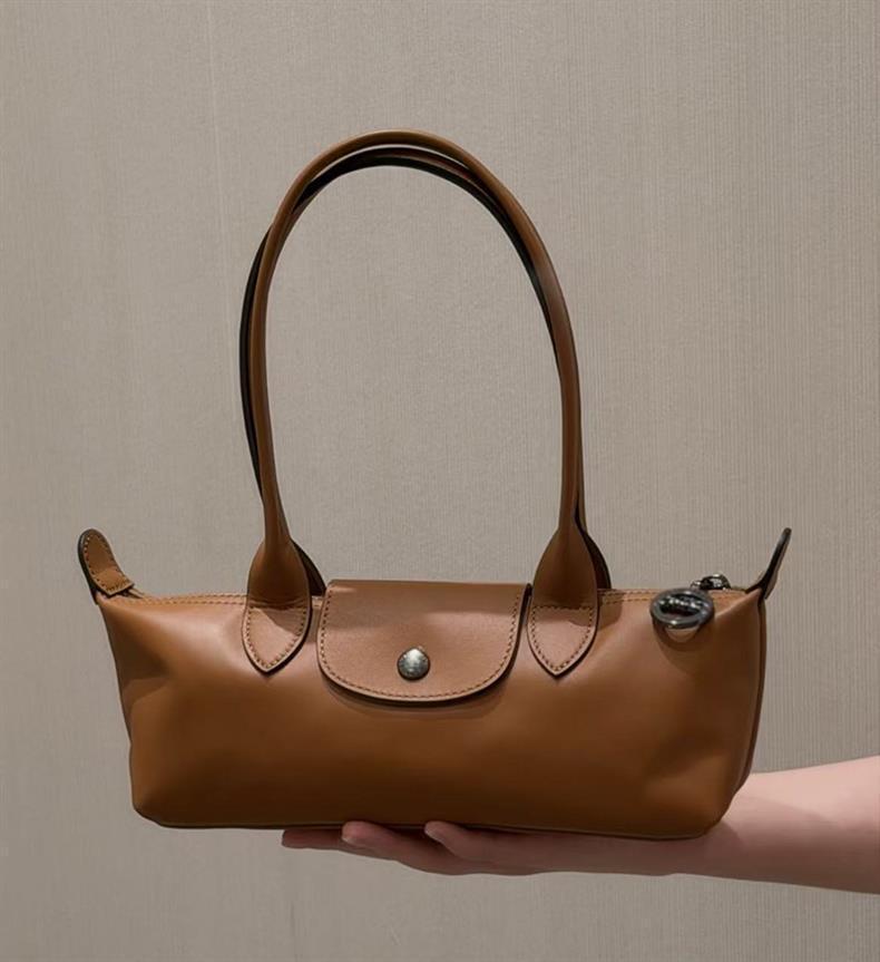 Mini Borsa a Gnocchi da Donna Estate 2026 Luce Lusso: Borsa a Spalla Baguette alla Moda, Versatile e di Grande Capacità.