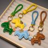 Trendy Leather Woven Rope 'Instant Wealth' Cartoon Keychain – Cute Car Key Accessory & Bag Pendant