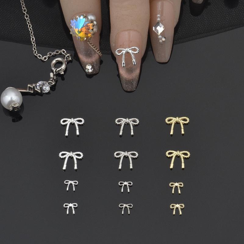 Oro Argento Fiori Accessori Manicure Unghie Unghie Gioielli Nail Art Fiocco Decorazioni Unghie Punte per Nail Art 3D