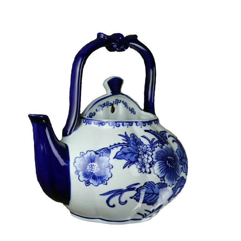 Hand-Painted Blue and White Ceramic Wall Vase with Floral and Bird Design