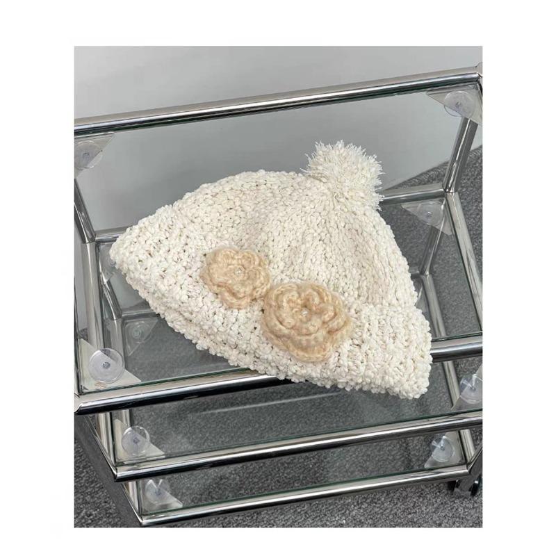 Korean atmosphere soft waxy coarse wool hat autumn and winter new crochet three-dimensional camellia knitted hat niche ear protection hat