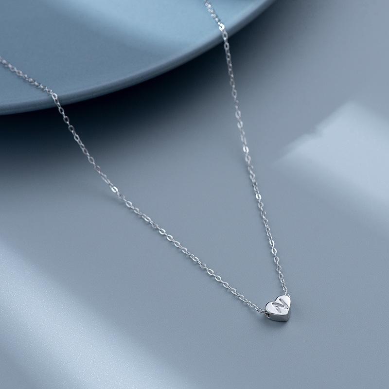 S925 Silver Heart-Shaped Initial Necklace - Korean Style Clavicle Chain with Trendy Peach Heart Design.