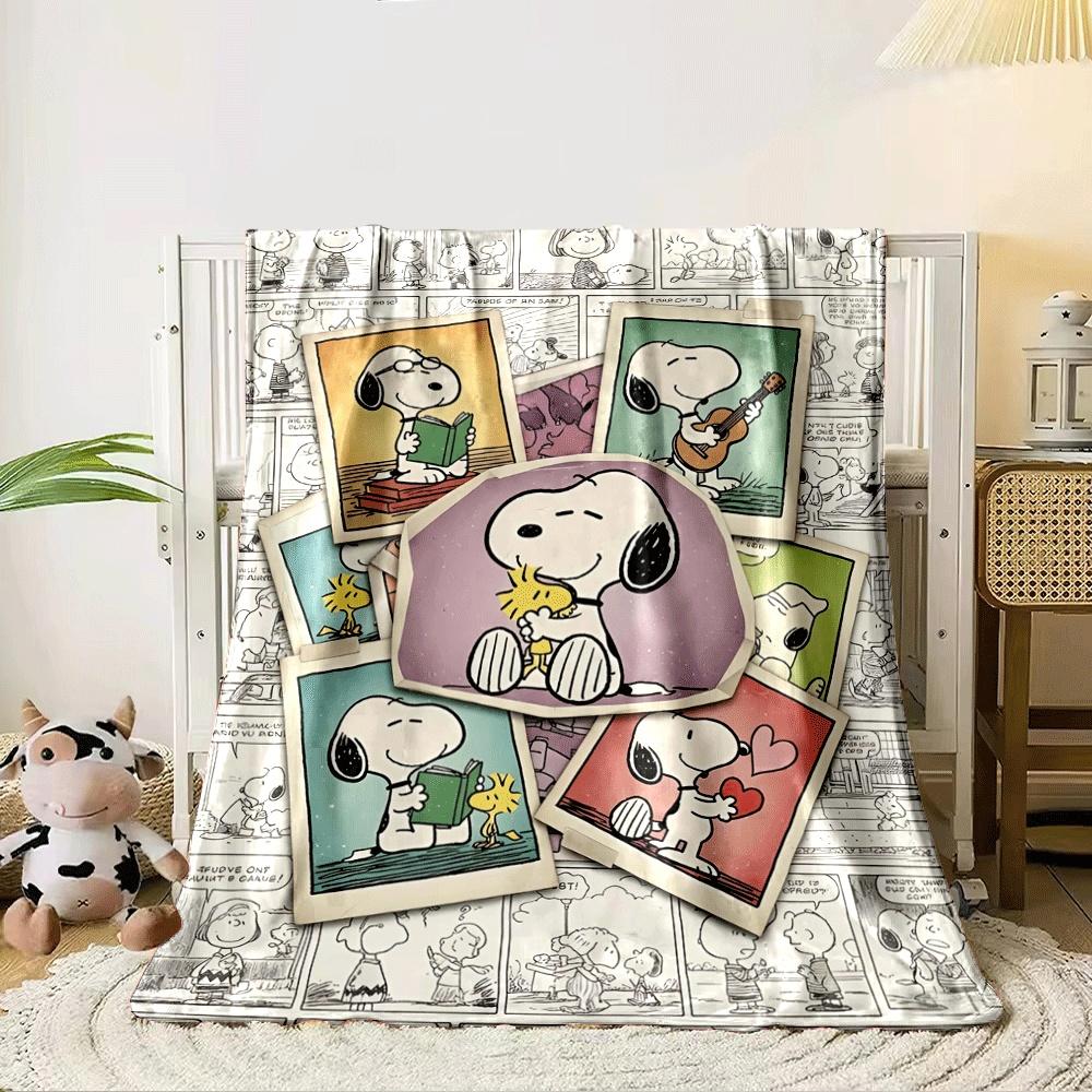 Snoopy-themed illustrations with various activities over comic strip backgrounds. for all seasons blanket lunch break throw gift 80cm x 120cm