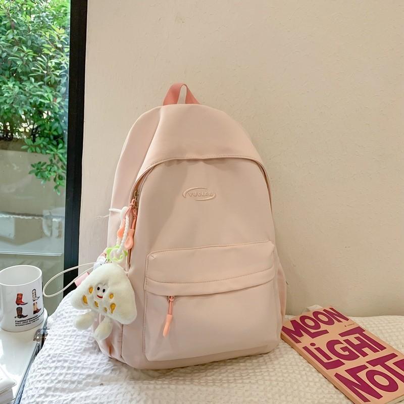 Стильный вместительный нейлоновый рюкзак для повседневных путешествий. Нейтральный дизайн. Водонепроницаемый. розовый