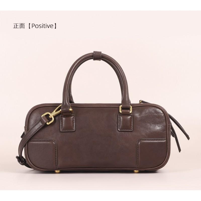 New Vegetable Tanned Leather Pillow Bag Women's Retro Niche Handbag Fashionable High-end Commuter Portable Boston
