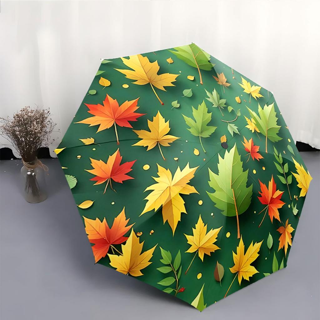 Automatic Folding Umbrella Autumn leaves on a green background. Portable collapsible design, casual outdoor accessory, for all