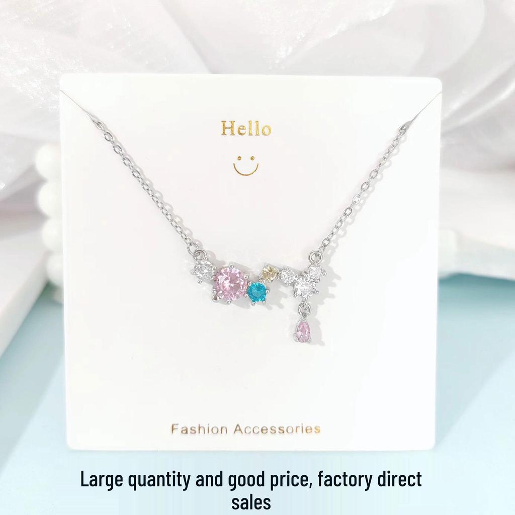 Pink Zircon Gourd Pendant Necklace with Floral Tassels - Titanium Steel Clavicle Chain for Women's Light Luxury.