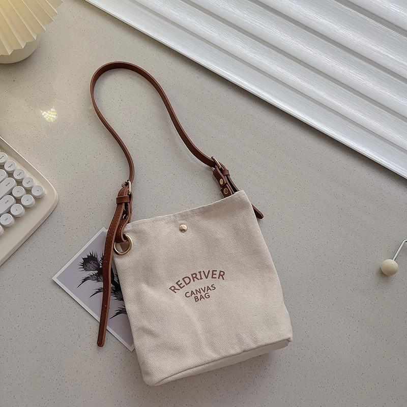 

Modern Stylish Canvas Shoulder Bag For Kids With Cute Design And Versatile Use