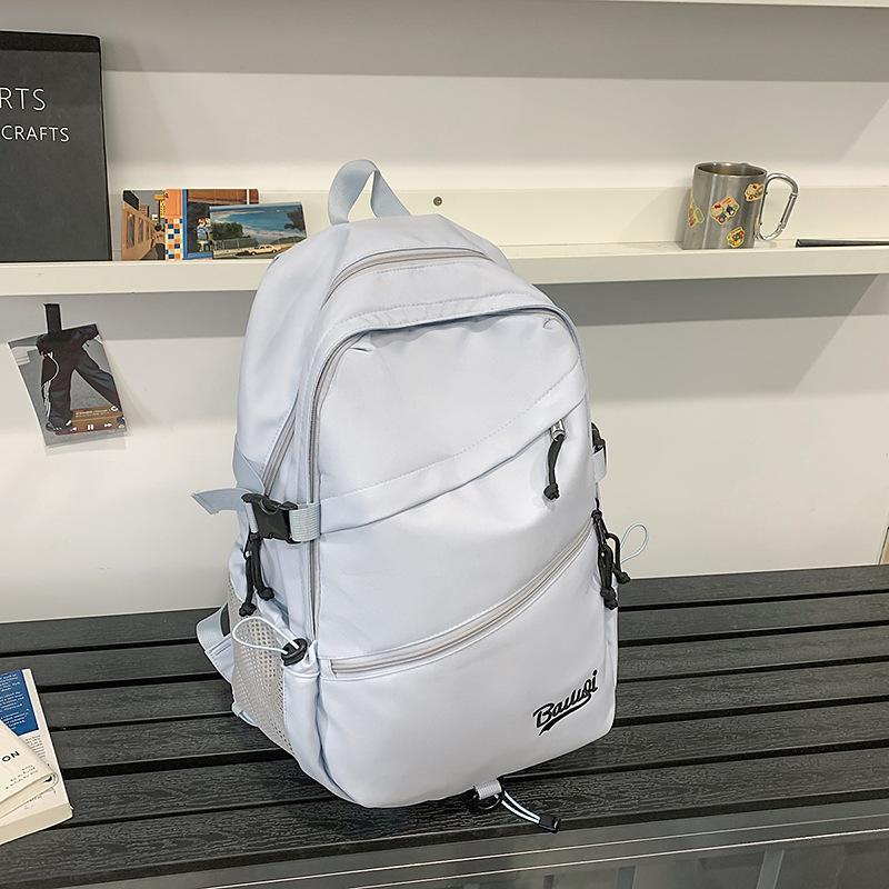 Schoolbag backpack Korean version solid color couple size travel backpack student large capacity anti-splashing light backpack wholesale