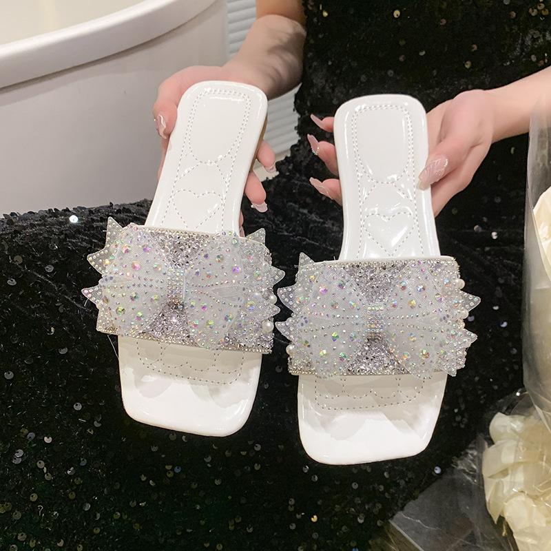 

Крутые шлепанцы с бантом женские шлепанцы носят новые прозрачные крутые шлепанцы со стразами летом 2025 40 белый