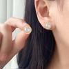 Minimalist Round Pearl Stud Earrings with Metal Frame Simple Small Size Lightweight Design Suitable for Daily Wear and Special Occasions