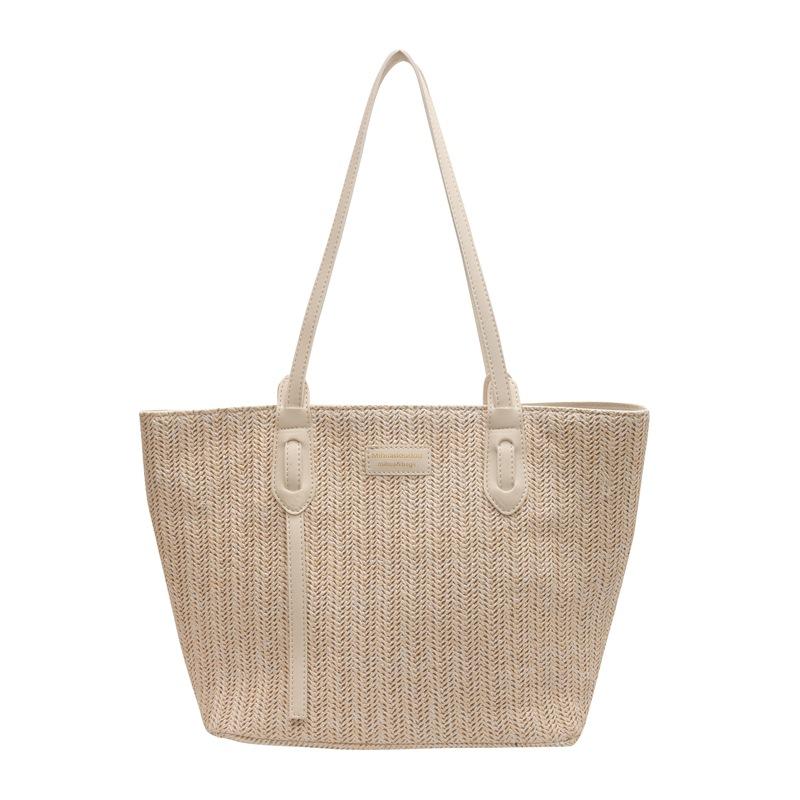 

Students carry large-capacity bags in class Women s simple leisure commuter tote bag Summer woven shoulder bag