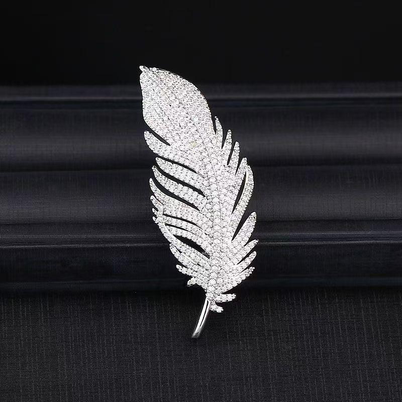 Korean Style Silver Zircon Feather Brooch for Ladies - Fashionable Suit Pin Corsage & Overcoat Accessory