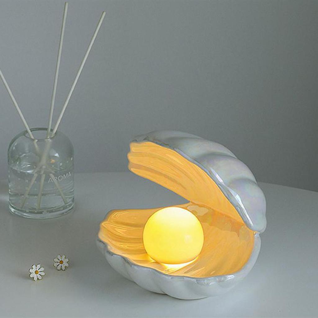 Veilleuse LED 3D en forme de coquillage, jaune chaud, alimentée par piles, idéale pour une chambre d'enfant ou un salon