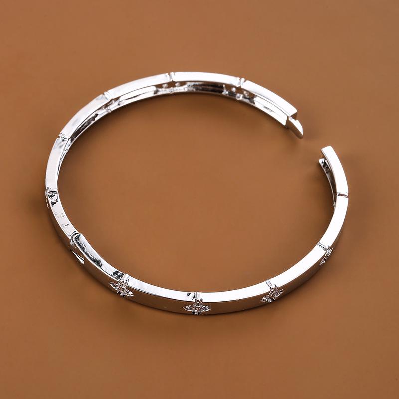 Exquisite Copper Zircon Four-Petal Flower Bracelet for Women