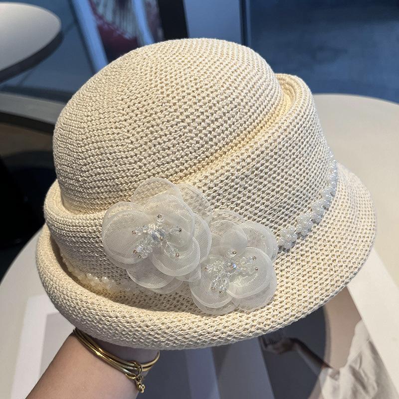 New French retro flower knitted pot hat women's spring and summer three-dimensional flower decoration shows a small face, sunshade and sunscreen tempe
