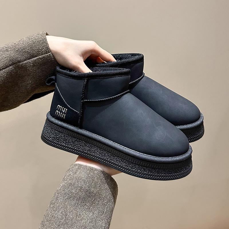 

Large size waterproof thick-soled leather snow boots women s 2025 new short tube Northeast thickened non-slip warm snow cotton shoes 41 чёрный