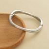 Design-inspired Metal Smooth-textured Open Bracelet, Minimalist Geometric, Individualistic Wide Wristband