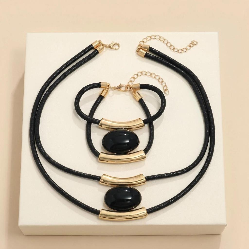 Conjunto de Joyería Bohemian de Acrílico con Ojo Ovalado de Caracol: Collar y Pulsera de Cordón de Cera para Mujer