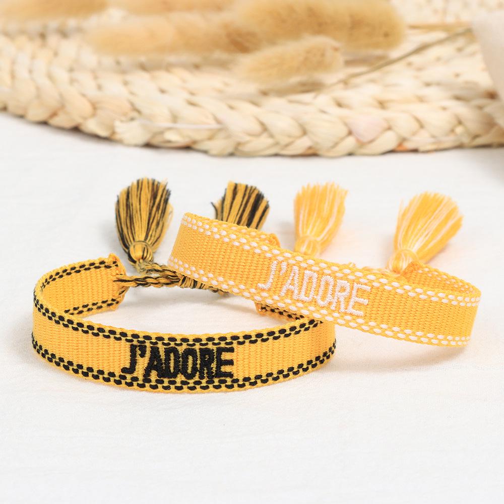 Pulseira Tecida Europeia e Americana de 1,3 cm com Bordado de Letras e Borla