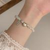 Baroque Pearl Heart Bracelet: Chic Light Luxury with Lucky Charm for a Sweet, Cool, and Elegant Look