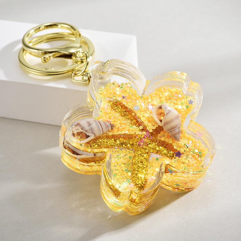 

Креативный мультяшный брелок с ракушкой сакуры и плавающим жидким наполнением, подвеска для сумки, милый брелок с зыбучим песком, подарок жёлтый